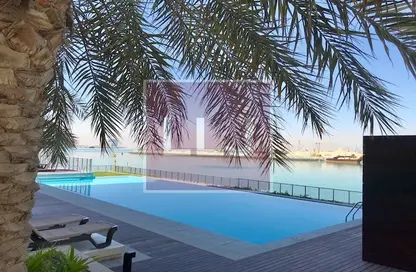 Pool image for: Duplex - 4 Bedrooms - 4 Bathrooms for sale in Beach Villas - Al Zeina - Al Raha Beach - Abu Dhabi, Image 1