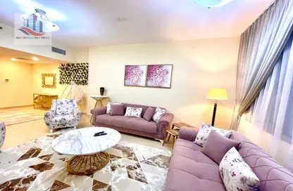 Living Room image for: Apartment - 2 Bedrooms - 2 Bathrooms for rent in Al Mamzar - Sharjah - Sharjah, Image 1