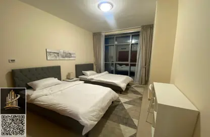 Apartment - 1 Bedroom - 2 Bathrooms for rent in Corniche Tower - Ajman Corniche Road - Ajman