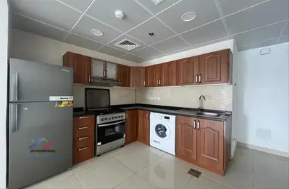 Kitchen image for: Apartment - 1 Bedroom - 2 Bathrooms for rent in MILANO by Giovanni Botique Suites - Jumeirah Village Circle - Dubai, Image 1