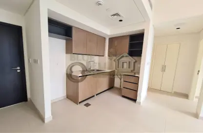 صورة لـ مطبخ شقة - غرفة نوم - 2 حمامات للايجار في برج التاج - دبي وسط المدينة - دبي ، صورة رقم 1