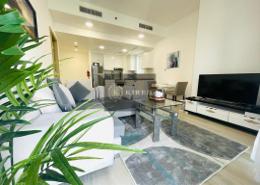 Living Room image for: Apartment - 1 bedroom - 2 bathrooms for rent in Bloom Towers - Jumeirah Village Circle - Dubai, Image 1