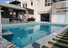 Villa - 3 bedrooms - 3 bathrooms for sale in The Townhouses at Al Hamra Village - Al Hamra Village - Ras Al Khaimah Pool image for: Villa - 3 bedrooms - 3 bathrooms for sale in The Townhouses at Al Hamra Village - Al Hamra Village - Ras Al Khaimah, Image 1