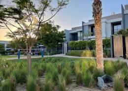 Garden image for: Villa - 3 bedrooms - 5 bathrooms for sale in Casa Flores - Green Community Motor City - Motor City - Dubai, Image 1
