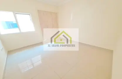 Empty Room image for: Apartment - 2 Bedrooms - 2 Bathrooms for rent in Al Nahda Complex - Al Nahda - Sharjah, Image 1