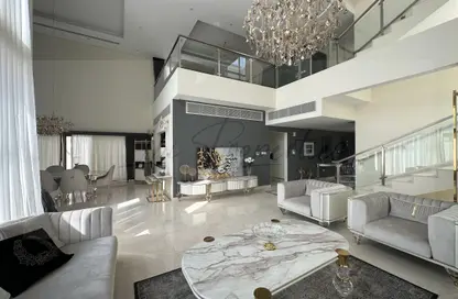 Living Room image for: Villa - 5 Bedrooms - 6 Bathrooms for sale in Grand Views - Meydan Gated Community - Meydan - Dubai, Image 1