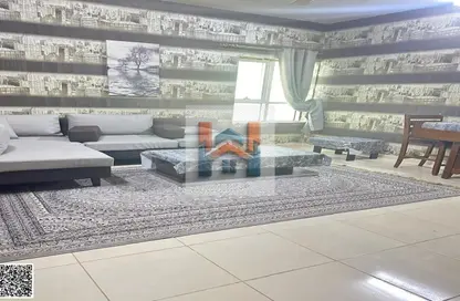 شقة - غرفة نوم - 2 حمامات للايجار في أورينت تاور 1 - أورينت تاور - البستان - عجمان