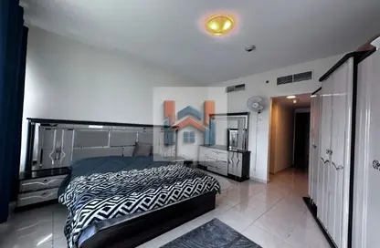 شقة - غرفة نوم - 2 حمامات للايجار في أورينت تاور 1 - أورينت تاور - البستان - عجمان