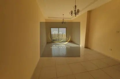 Empty Room image for: Apartment - 1 Bedroom - 2 Bathrooms for sale in Lilies Tower - Emirates City - Ajman, Image 1