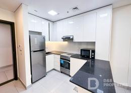 صورةمطبخ لـ: شقة - 1 غرفة نوم - 1 حمام للبيع في الاجنحه - ارجان - دبي, صورة 1