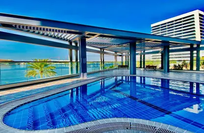 Pool image for: Apartment - 2 Bedrooms - 3 Bathrooms for rent in Jamam Residence - Al Raha Beach - Abu Dhabi, Image 1