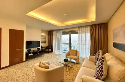 صورة لـ غرفة المعيشة شقة - غرفة نوم - 2 حمامات للبيع في فندق العنوان دبي مول - دبي وسط المدينة - دبي ، صورة رقم 1