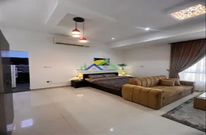 Living Room image for: Apartment - 1 Bathroom for rent in Magar Al Dhabi - Falaj Hazzaa - Al Ain, Image 1