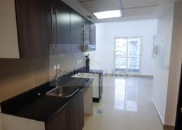 Kitchen image for: Studio - 1 bathroom for rent in Tower 21 - Al Reef Downtown - Al Reef - Abu Dhabi, Image 1