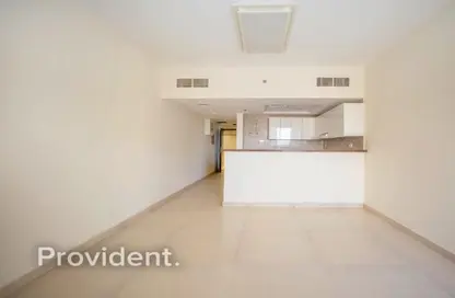 Empty Room image for: Apartment - 1 Bathroom for sale in Eden Garden - Dubai Sports City - Dubai, Image 1