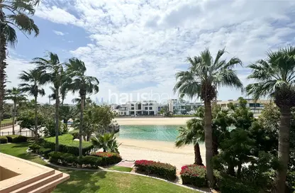 Villa - 4 Bedrooms - 5 Bathrooms for rent in Canal Cove Frond I - Canal Cove Villas - Palm Jumeirah - Dubai