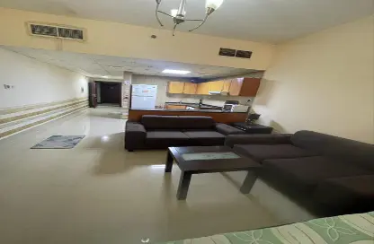 Living Room image for: Apartment - 1 Bathroom for rent in Al Naemiya Tower 3 - Al Naemiya Towers - Al Nuaimiya - Ajman, Image 1