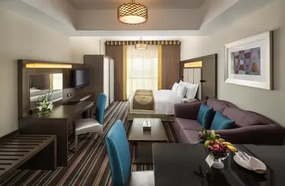 Living / Dining Room image for: Apartment - 1 Bathroom for rent in Mankhool - Bur Dubai - Dubai, Image 1