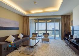 صورةغرفة المعيشة لـ: شقة - 1 غرفة نوم - 2 حمامات للكراء في فندق العنوان دبي مول - دبي وسط المدينة - دبي, صورة 1