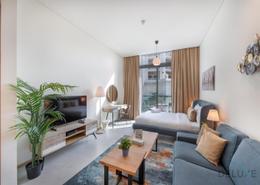 صورةغرفة المعيشة لـ: Studio - 1 حمام للكراء في احياء سيجنيتشر السكنية - قرية الجميرا سركل - دبي, صورة 1