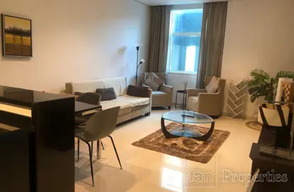 Living / Dining Room image for: Apartment - 1 Bedroom - 2 Bathrooms for rent in Damac Maison Cour Jardin - Business Bay - Dubai, Image 1