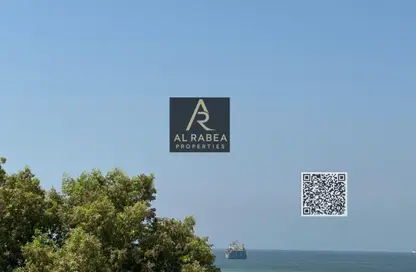 Apartment - 1 Bedroom - 2 Bathrooms for rent in Corniche Tower - Ajman Corniche Road - Ajman