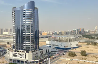 شقة - غرفة نوم - 2 حمامات للايجار في برج بلو ويفز - مجمع دبي ريزيدنس - دبي