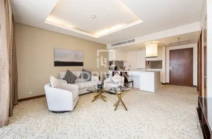 Living Room image for: Apartment - 1 Bedroom - 2 Bathrooms for sale in The Address Dubai Mall - Downtown Dubai - Dubai, Image 1