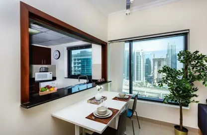 صورة لـ غرفة الطعام شقة - غرفة نوم - 1 حمام للايجار في برج الزمان والمكان - دبي مارينا - دبي ، صورة رقم 1