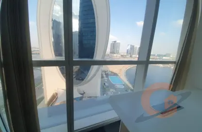 صورة لـ شرفة مكتب - استوديو - 1 حمام للايجار في B2B  برج - الخليج التجاري - دبي ، صورة رقم 1
