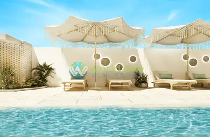 Pool image for: Apartment - 2 Bedrooms - 3 Bathrooms for sale in Luma 22 - Jumeirah Village Circle - Dubai, Image 1