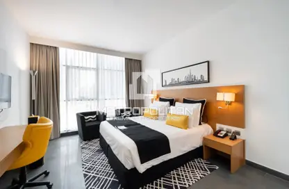 Room / Bedroom image for: Apartment - 1 Bathroom for sale in Sky Central Hotel - Barsha Heights (Tecom) - Dubai, Image 1