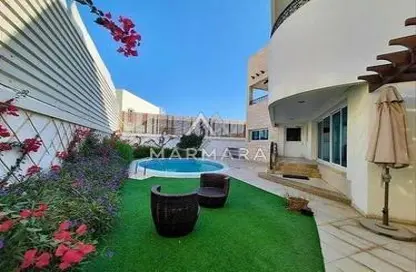 Villa - 4 Bedrooms - 4 Bathrooms for rent in Jumeirah 1 Villas - Jumeirah 1 - Jumeirah - Dubai