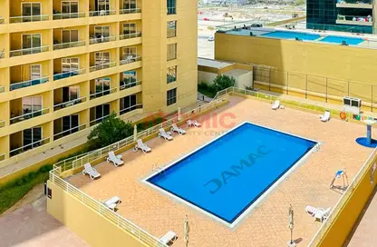 Pool image for: Apartment - 1 Bathroom for sale in Lakeside Tower D - Lakeside Residence - Dubai Production City (IMPZ) - Dubai, Image 1