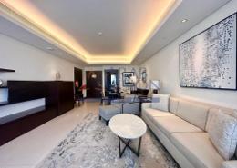 صورةغرفة المعيشة لـ: شقة - 1 غرفة نوم - 2 حمامات للكراء في فندق العنوان داونتاون - دبي وسط المدينة - دبي, صورة 1