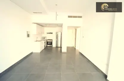 Empty Room image for: Apartment - 1 Bedroom - 2 Bathrooms for sale in Platinum Residences 1 - Dubai Silicon Oasis - Dubai, Image 1