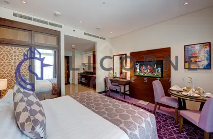 Apartment - Studio - 1 Bathroom for rent in Royal Continental Suites - Business Bay - Dubai