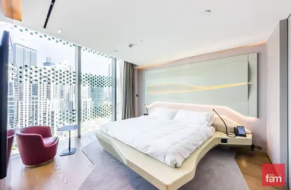صورة لـ غرفة- غرفة النوم النزل و الشقق الفندقية - غرفة نوم - 2 حمامات للبيع في برج أوبوس - الخليج التجاري - دبي ، صورة رقم 1