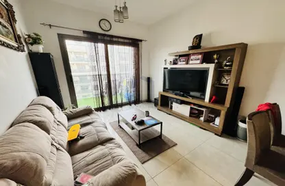 صورة لـ غرفة المعيشة شقة - 2 غرف نوم - 3 حمامات للبيع في غرين دايمند - ارجان - دبي ، صورة رقم 1