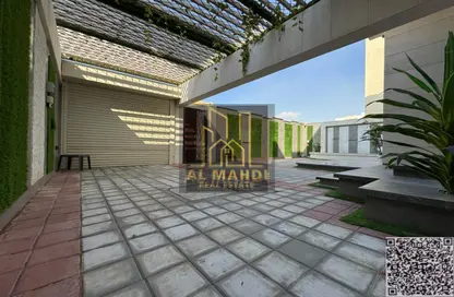 Villa - 5 Bedrooms - 7 Bathrooms for sale in Ajman Hills - Al Alia - Ajman