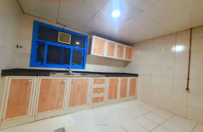Kitchen image for: Apartment - 2 Bedrooms - 2 Bathrooms for rent in Ibtikar 2 - Al Majaz 2 - Al Majaz - Sharjah, Image 1