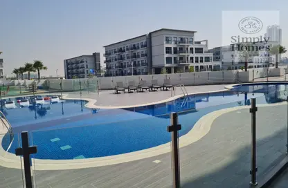 Pool image for: Apartment - 1 Bathroom for rent in Samana Golf Avenue - Dubai Studio City - Dubai, Image 1