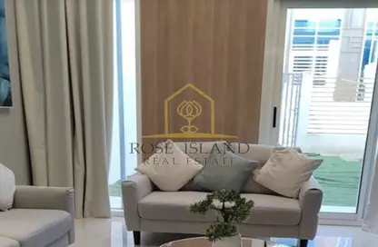 Living Room image for: Townhouse - 1 Bedroom - 2 Bathrooms for sale in Rukan Tower - Dubai Land - Dubai, Image 1