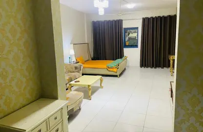Living Room image for: Apartment - 1 Bathroom for rent in Geepas Building 3 - Al Rashidiya 2 - Al Rashidiya - Ajman, Image 1