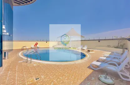 صورة لـ حوض سباحة شقة - 2 غرف نوم - 2 حمامات للايجار في شارع إلكترا - أبوظبي ، صورة رقم 1