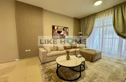 Living Room image for: Apartment - 1 Bedroom - 2 Bathrooms for rent in Laya Residences - Jumeirah Village Circle - Dubai, Image 1