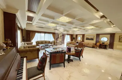 Living / Dining Room image for: Penthouse - 5 Bedrooms - 5 Bathrooms for rent in Emirates Hills 2 - Dubai, Image 1