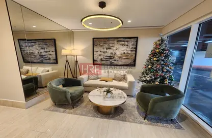 Living Room image for: Apartment - 1 Bathroom for sale in Viridis D - Viridis Residence and Hotel Apartments - Damac Hills 2 - Dubai, Image 1