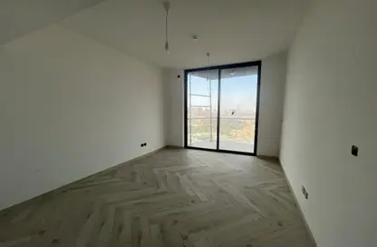 Empty Room image for: Apartment - 2 Bedrooms - 3 Bathrooms for sale in Empire Residence - Jumeirah Village Circle - Dubai, Image 1