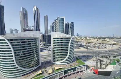 Outdoor Building image for: Office Space - Studio - 3 Bathrooms for rent in B2B Tower - Business Bay - Dubai, Image 1